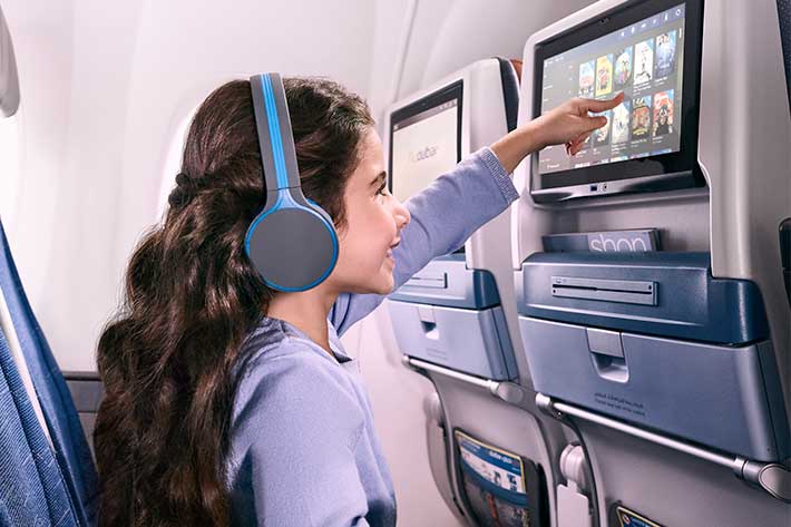 Child using flydubai in-flight entertainment system